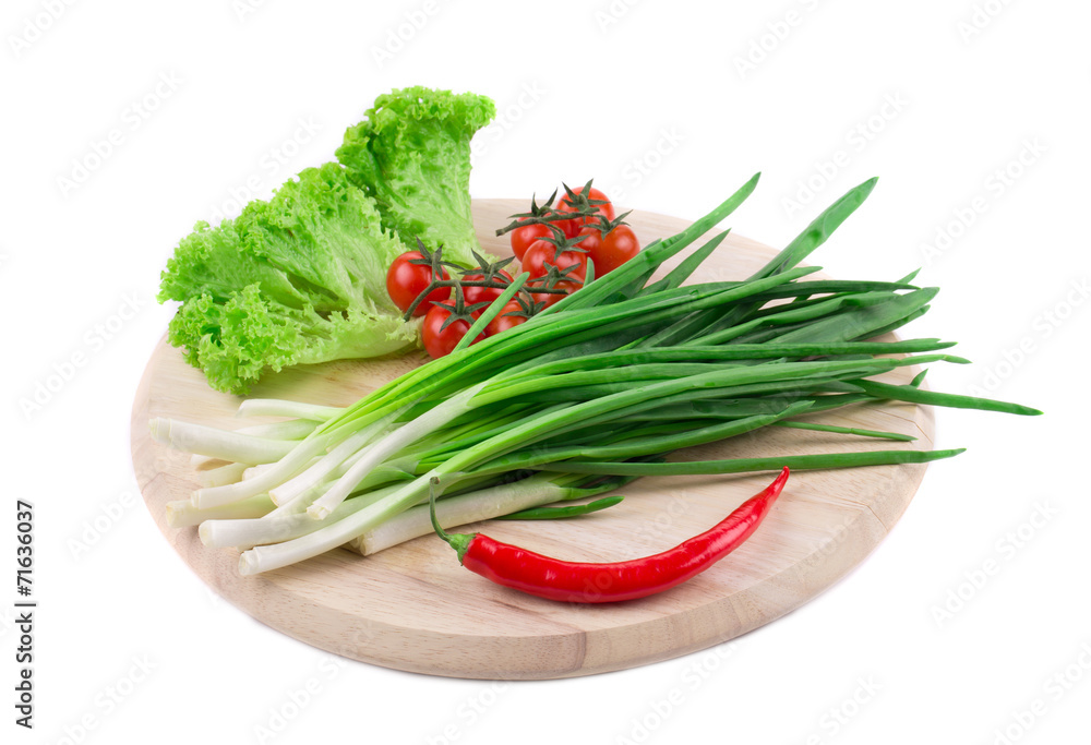Fresh vegetables and spices on cutting board Fresh vegetables and spices on cutting board