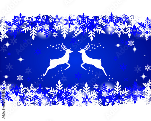 Reindeer with stars, snowflakes and glitter on a blue background