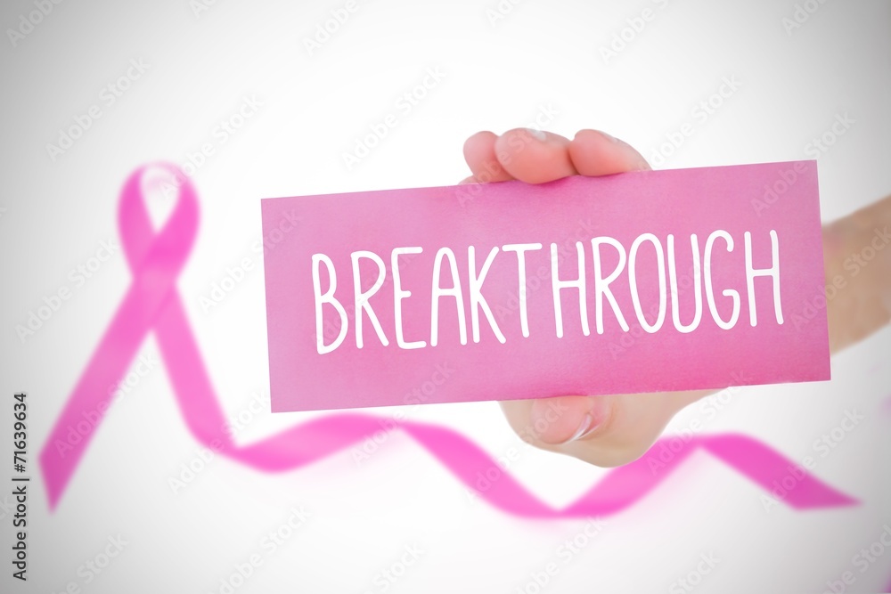 Composite image of young woman holding pink card Composite image of young woman holding pink card