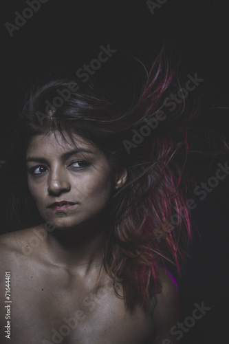 Beautiful latina woman with hair flying