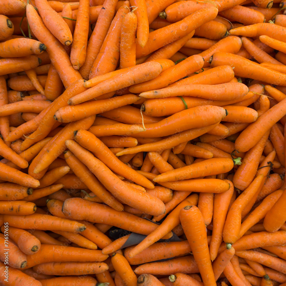 carrot background. Raw fresh carrots close up. carrot background. Raw fresh carrots close up.