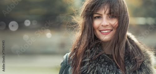 Young woman outdoors portrait. photo