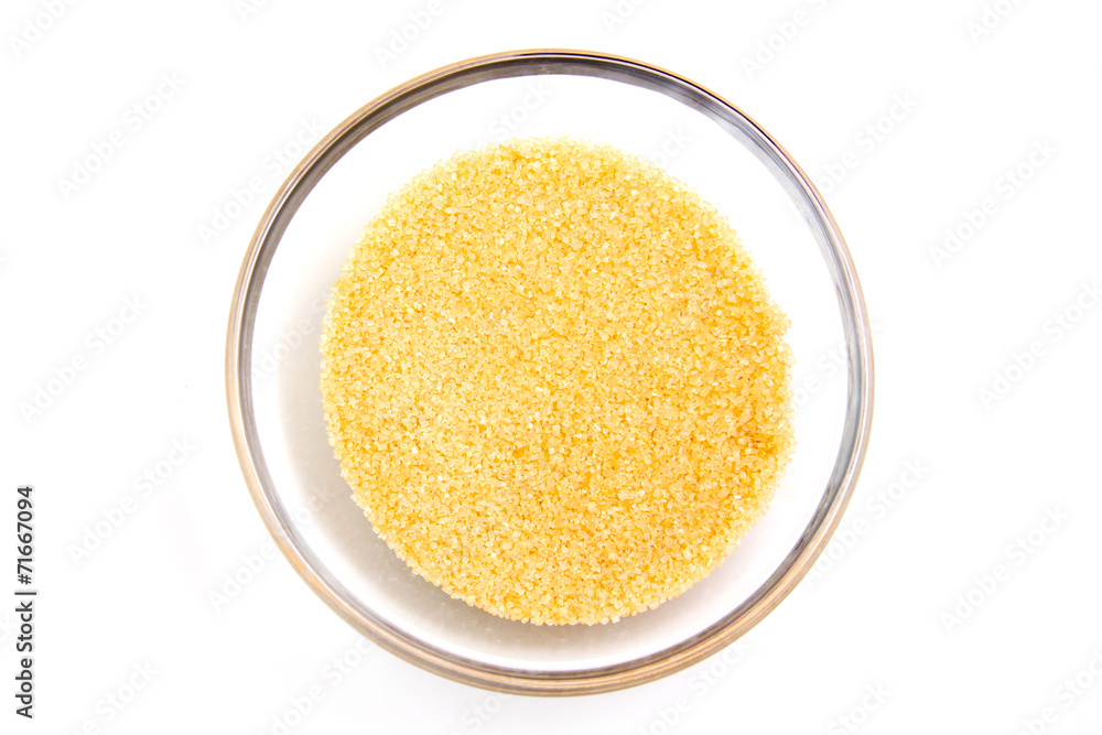 Brown sugar in bowl on white background Brown sugar in bowl on white background