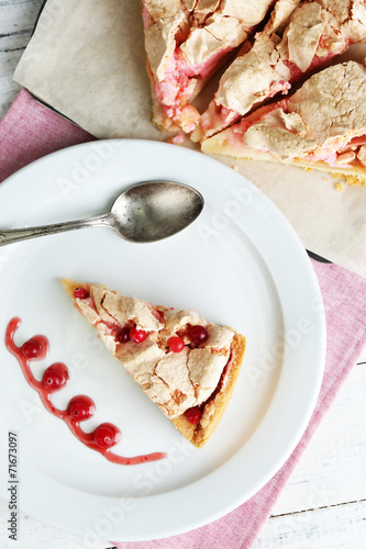 Piece of tasty pie with apples and berry mousse,