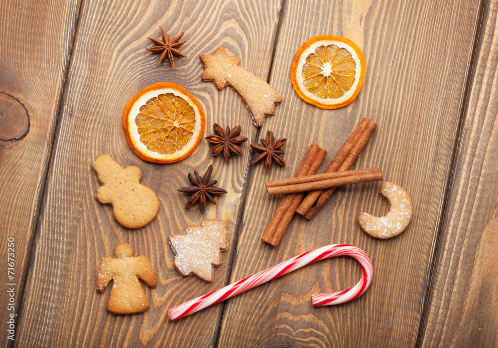 Christmas food decoration with gingerbread cookies, spices and c Christmas food decoration with gingerbread cookies, spices and c