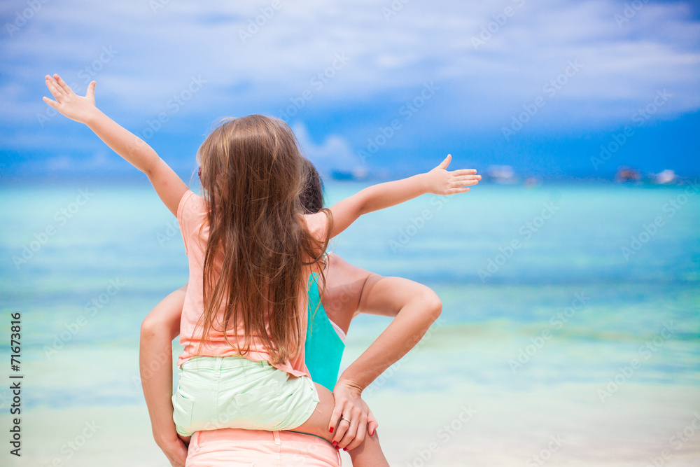 Young mother and her adorable little daughter have fun at Young mother and her adorable little daughter have fun at