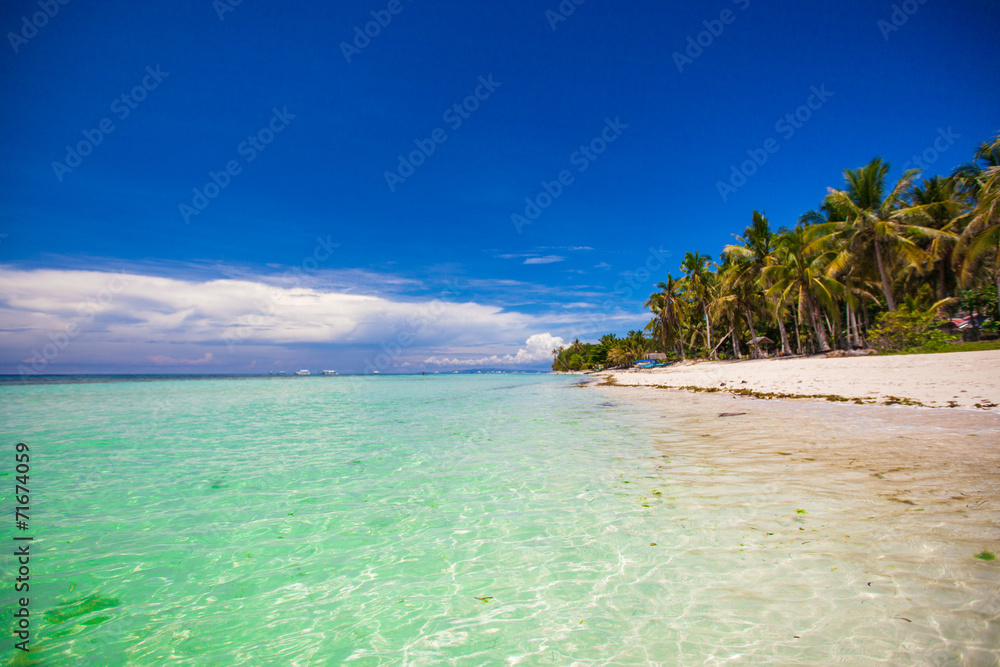 Perfect tropical beach with turquoise water and white sand