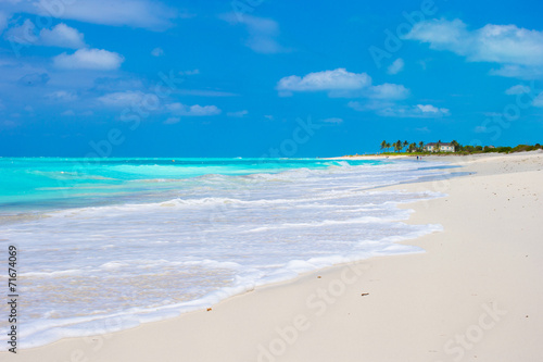 Perfect white beach with turquoise water on Caribbean island © travnikovstudio