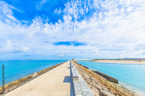 Breakwater with benches and the horizon