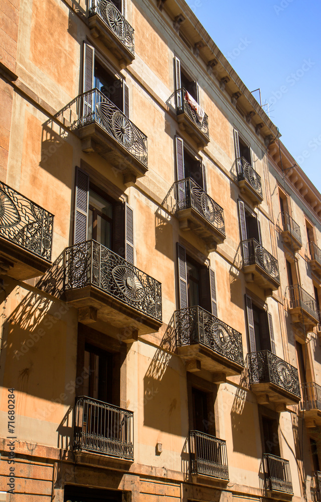 Old building with shutters and balconies