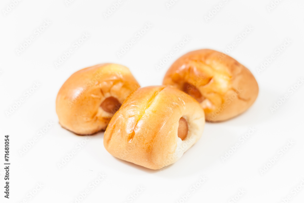 Sausage in the dough isolated on white background Sausage in the dough isolated on white background