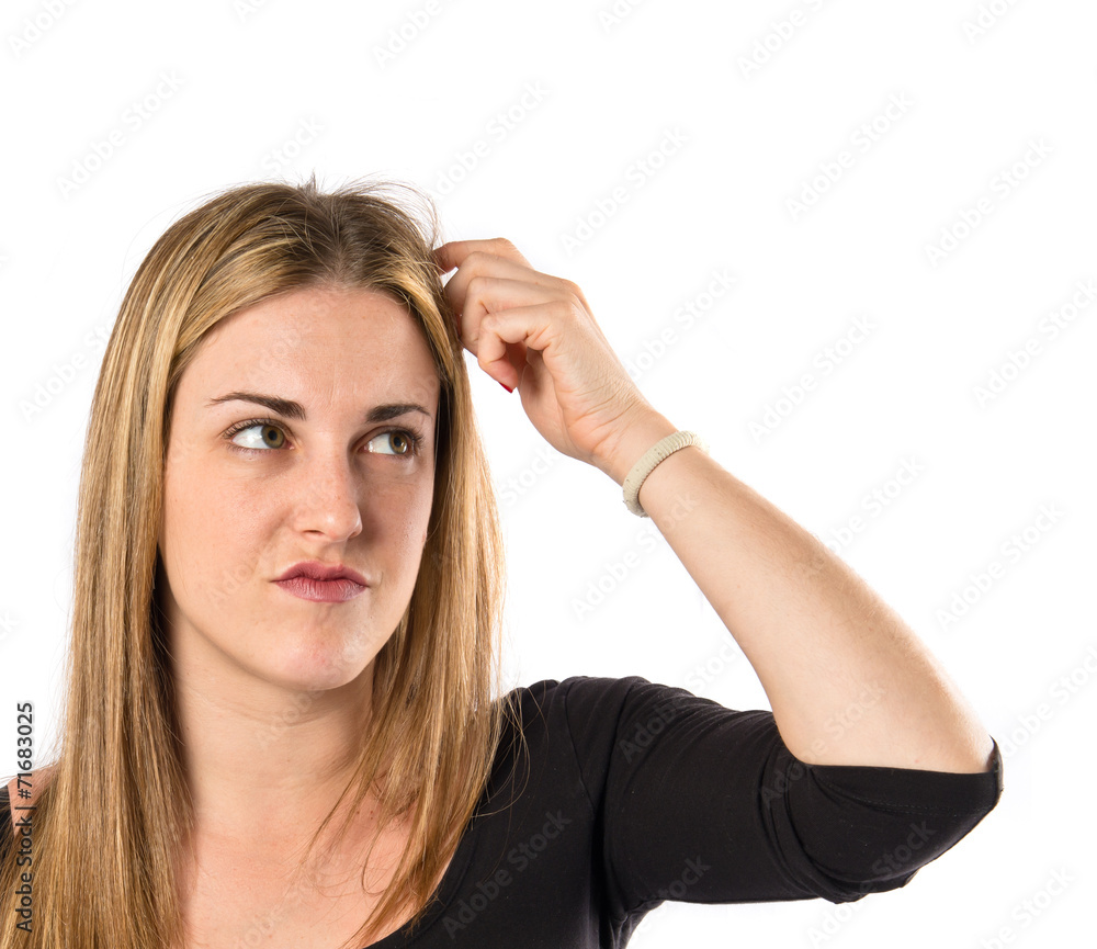 Girl thinking over isolated white background Girl thinking over isolated white background