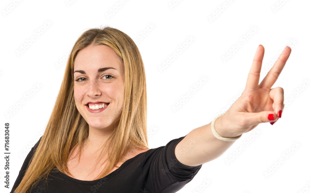 Lucky girl over isolated white background Lucky girl over isolated white background