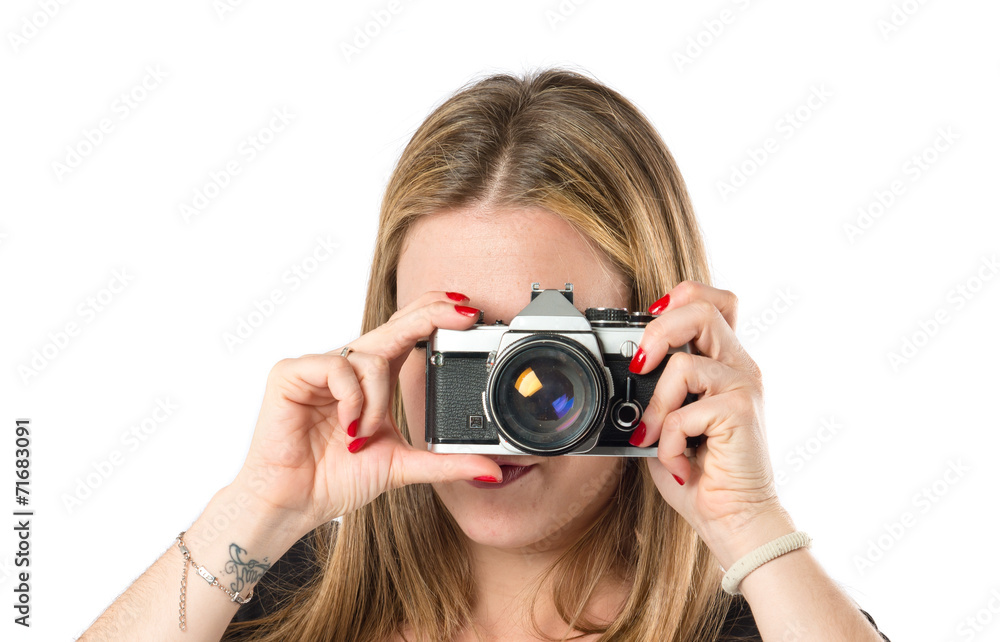 Girl photographing over white background Girl photographing over white background
