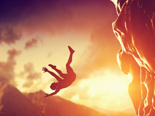 Hiker free falling from the mountain. Man in fatal situation