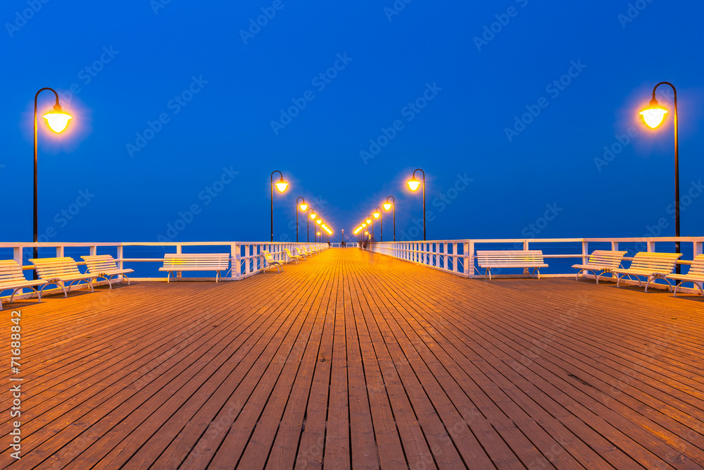 Obraz premium Wooden pier at Baltic sea in Gdynia Orlowo, Poland