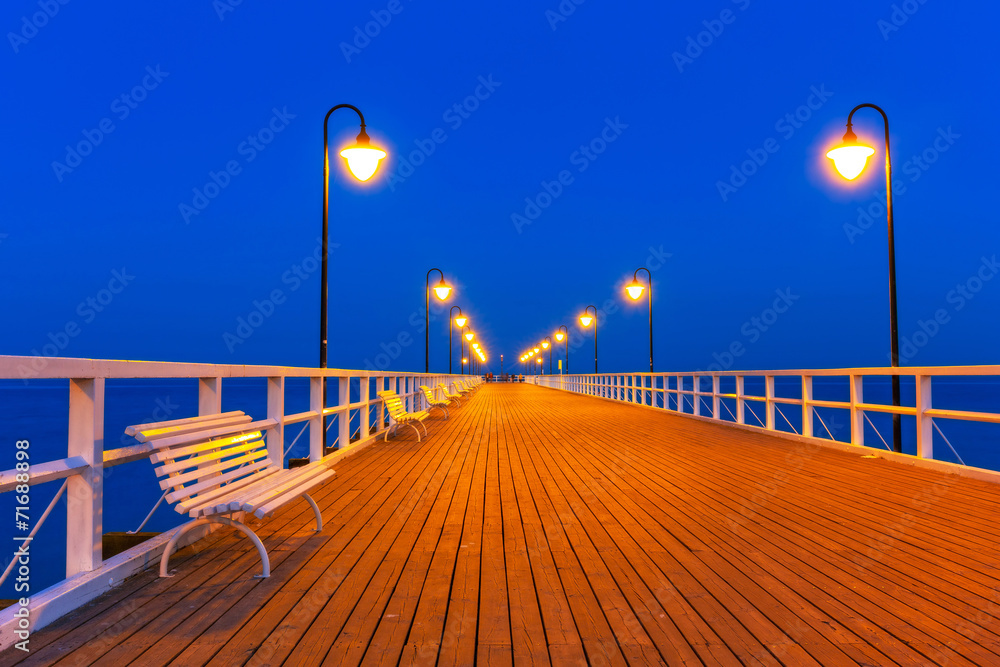 Fototapeta premium Wooden pier at Baltic sea in Gdynia Orlowo, Poland