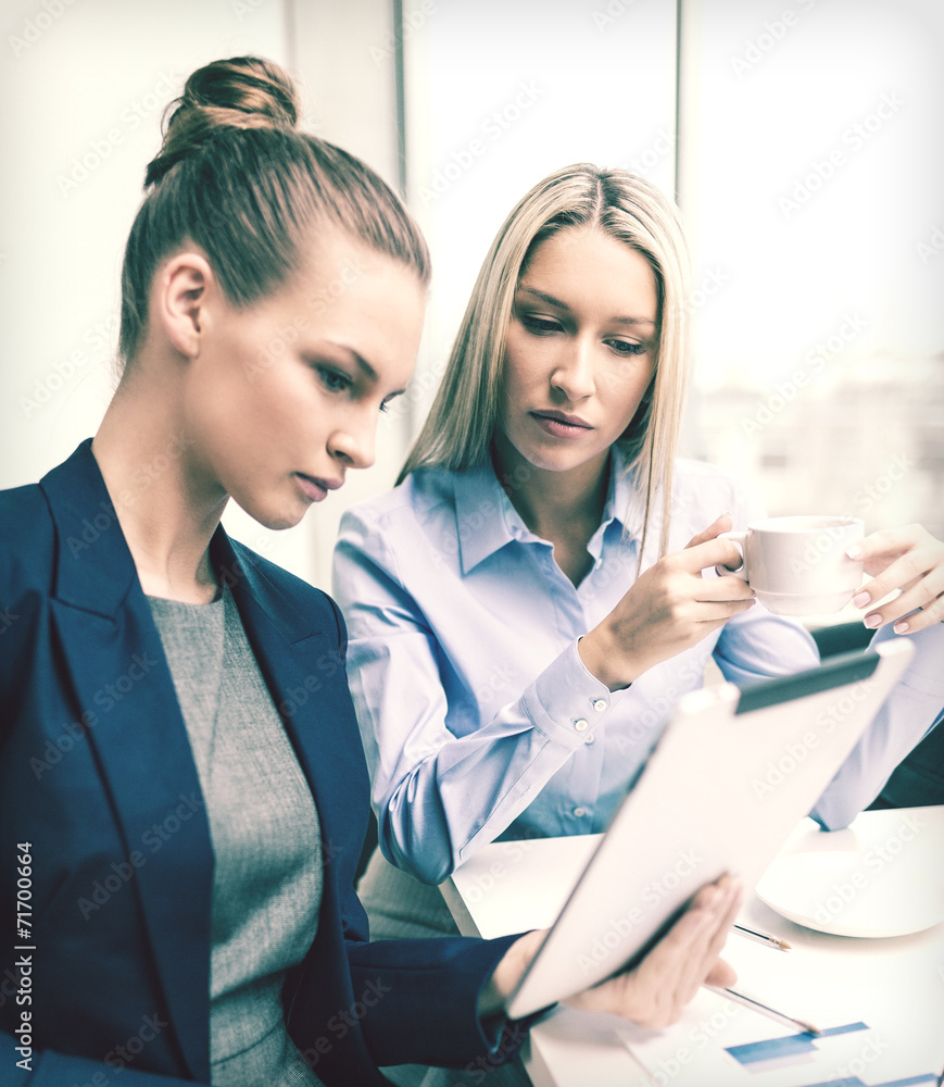 business team with tablet pc having discussion business team with tablet pc having discussion