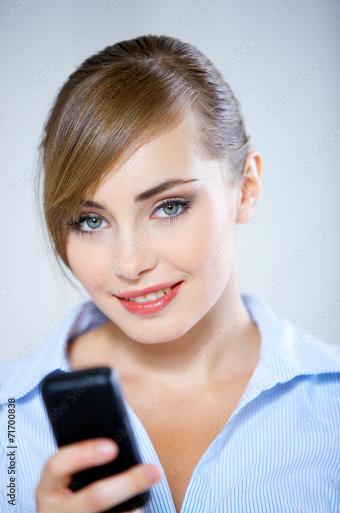 Pretty Smiling Woman Using Black Mobile Phone Pretty Smiling Woman Using Black Mobile Phone
