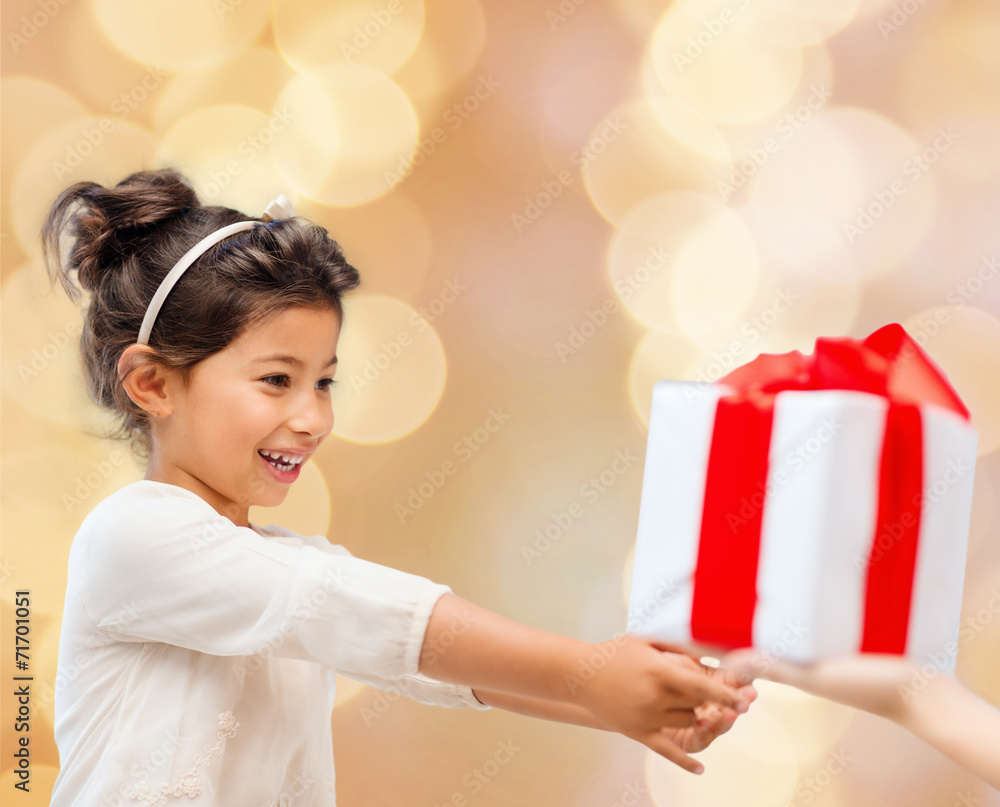smiling little girl with gift box smiling little girl with gift box