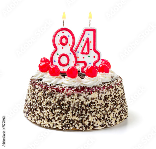 Geburtstagstorte mit brennender Kerze Nummer 84