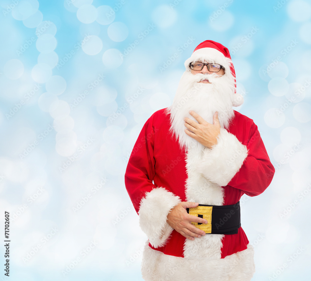man in costume of santa claus man in costume of santa claus