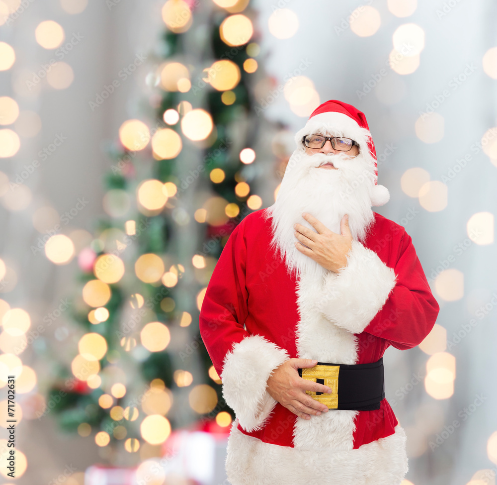 man in costume of santa claus man in costume of santa claus