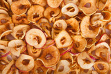 scattered dried apples. background.