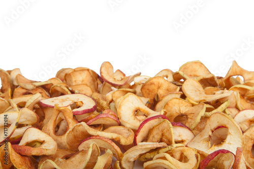 scattered dried apples isolated on white background.