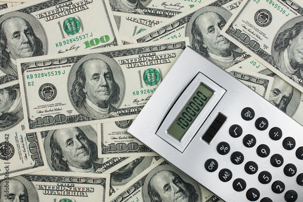 Fototapeta premium Calculator lies on a million dollars