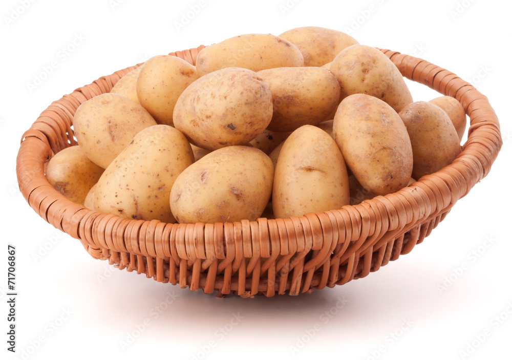 Potato tuber in wicker basket isolated on white background Potato tuber in wicker basket isolated on white background
