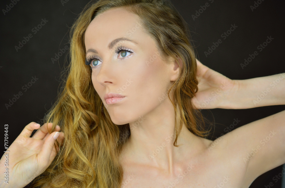 Fototapeta premium Beautiful woman with curly hair