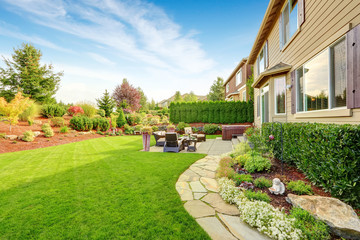 Rideaux Beige Luxury house exterior with impressive backyard landscape design  © Iriana Shiyan