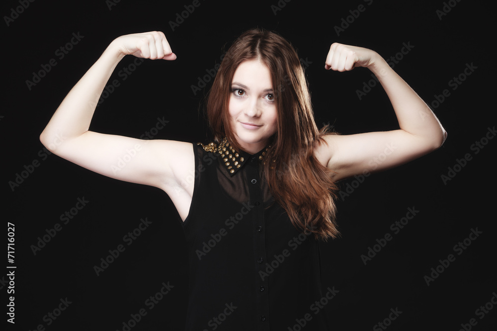 teen girl showing her muscles on black teen girl showing her muscles on black