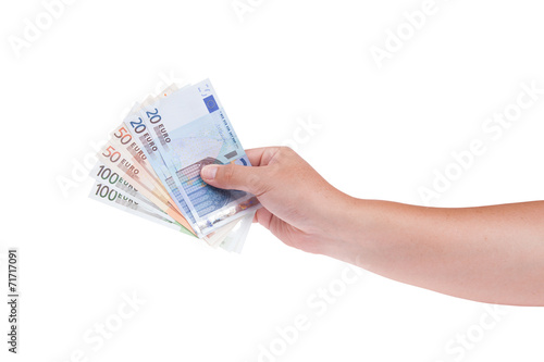 Hand with money isolated on a white background