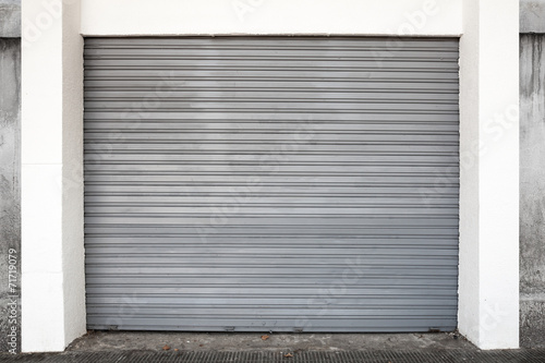 Gray metal garage gate, background photo texture