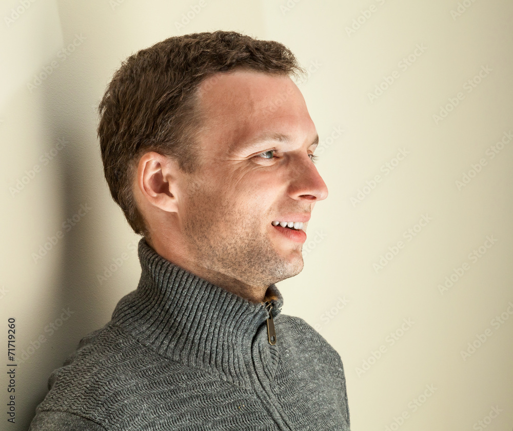 Fototapeta premium Young smiling Caucasian man close up portrait