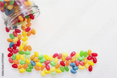 Cuadro en lienzo Jelly beans with a glass jar