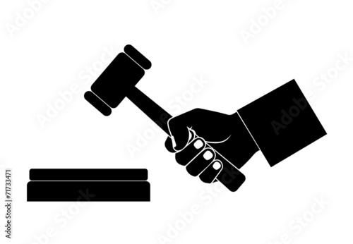 silhouette of the hand with a hammer