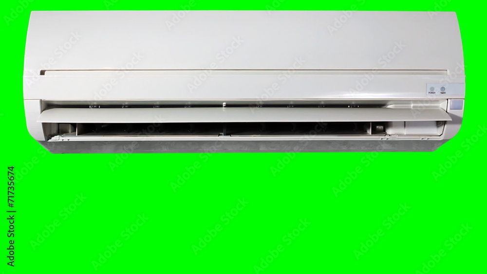 air-conditioner and remote control isolated on green background air-conditioner and remote control isolated on green background