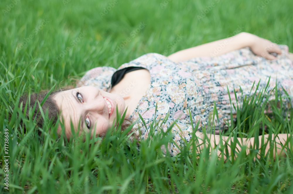 girl lying on the grass girl lying on the grass