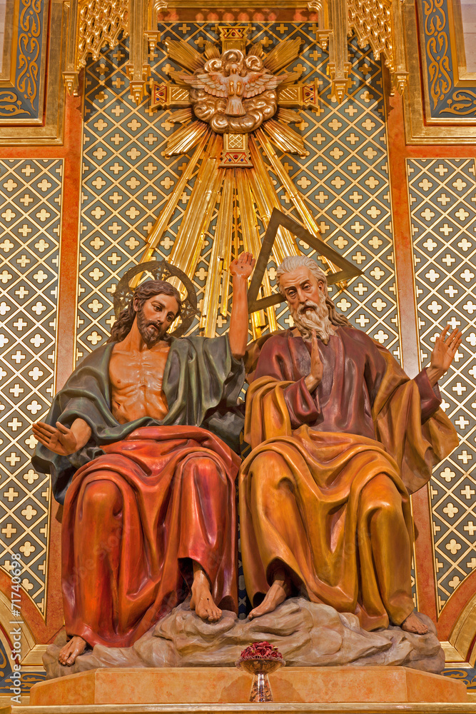 Madrid - Statue of Trinity from altar of Almudena cathedral