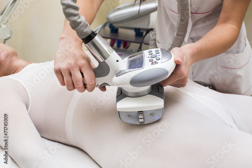 woman is in the process at the clinic lipomassage