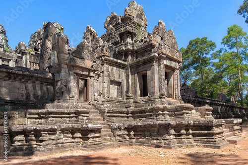 The ancient ruins of a historic Khmer temple in the temple compl © frolova_elena