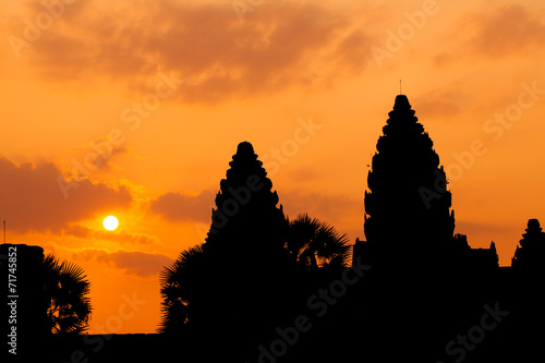 The ancient ruins of a historic Khmer temple in the temple compl