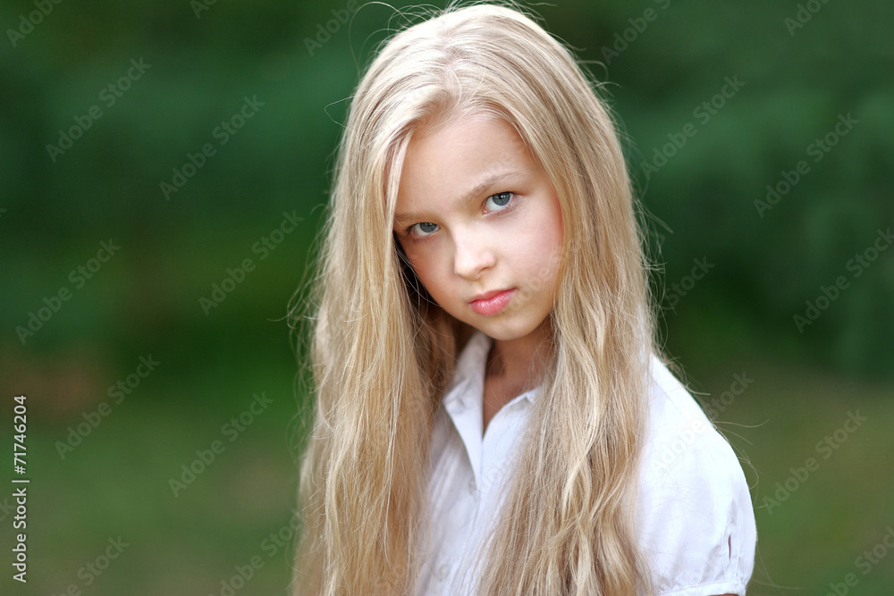 portrait of little girl outdoors in summer portrait of little girl outdoors in summer
