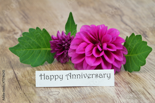 Happy anniversary card with purple dahlia flower