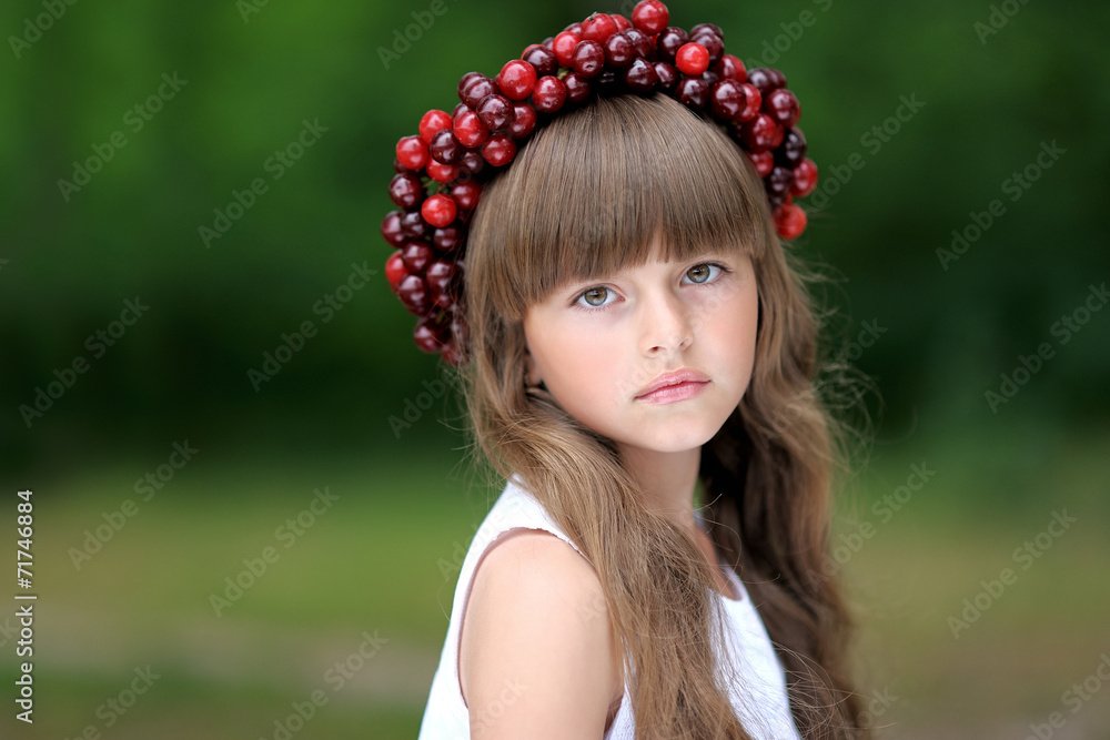 portrait of little girl with a wreath of cherry portrait of little girl with a wreath of cherry