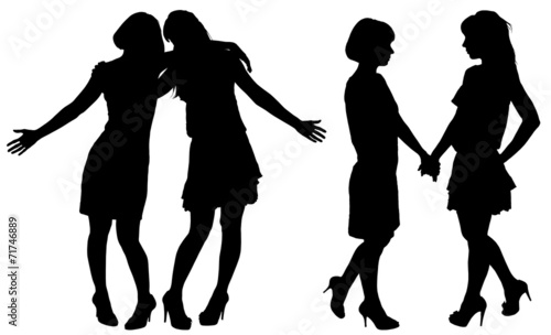 silhouette of two young slender women
