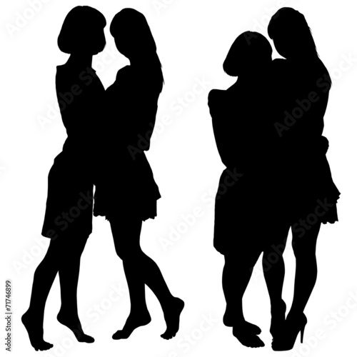 silhouette of two young slender women